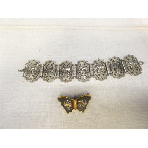 259 - Indian white metal bracelet and oriental butterfly brooch.