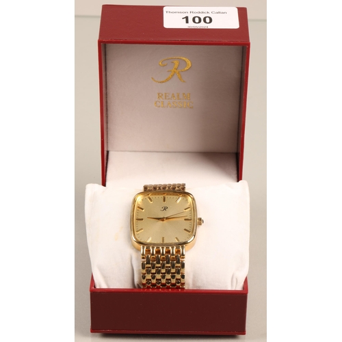 100 - Realm Classic gold toned wristwatch, with box