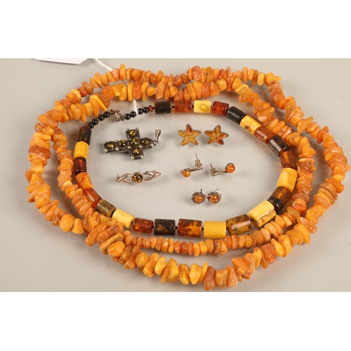 114 - Assorted resin / amber jewellery including three pairs silver earrings, brooch, and pendant, and two... 