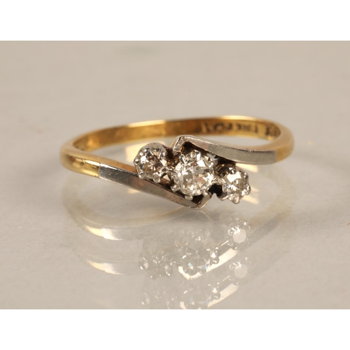 119 - 18k gold and platinum ring set with a trio of diamonds, ring size P/Q, gross weight 2.8g