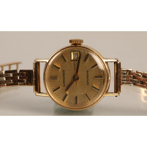 133 - 9ct gold Longines automatic wrist watch'18g