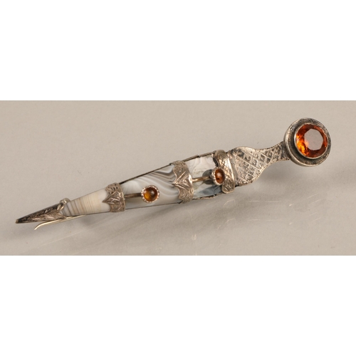 134 - White metal Dirk brooch set with agate and orange gems