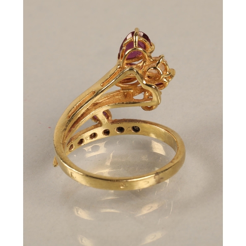 135 - Yellow metal ring set with diamonds and pink and white gems, illegible markings, ring size L/M