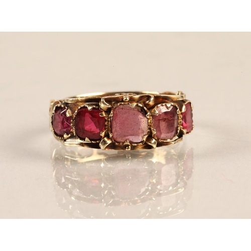 79 - 12ct gold ring set with five graduated Rubies, gross weight 2g, ring size M