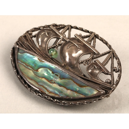 83 - Arts and crafts / Glasgow style silver brooch set with iridescent glass panel, signed 'PG 96' illegi... 