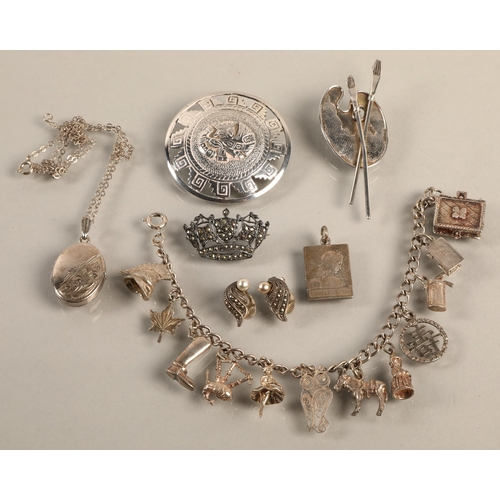 85 - Assorted vintage silver jewellery including charm bracelet, locket necklace, marcasite, a silver bro... 