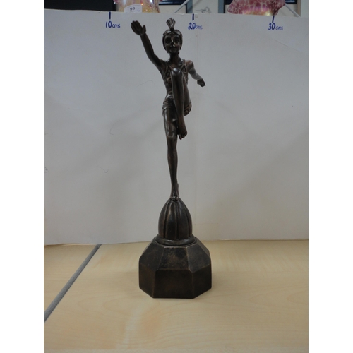 100 - Two reproduction Art Deco-style female figurines to include a bronzed example and the other in the s... 