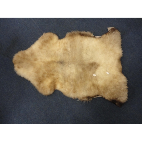 114 - Two John Lewis sheepskin rugs.  (2)