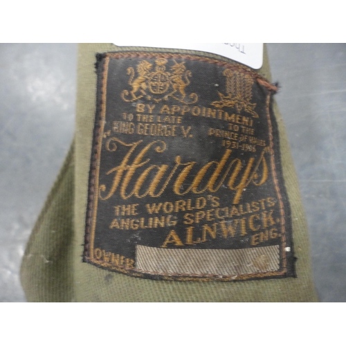 123 - Hardy's of Alnwick split cane two-piece fishing rod in canvas outer bag.