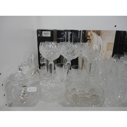 137 - Crystal to include brandy glasses, wine glasses, knife rests, dishes etc (one shelf).