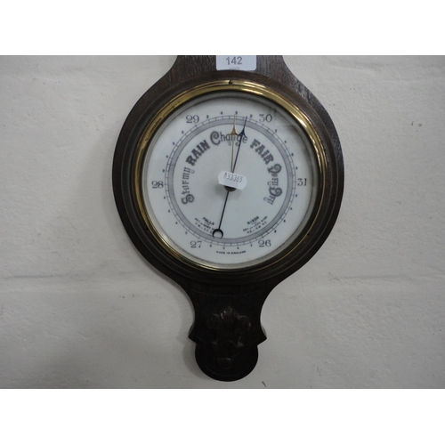 142 - Oak banjo wall barometer with thermometer gauge.