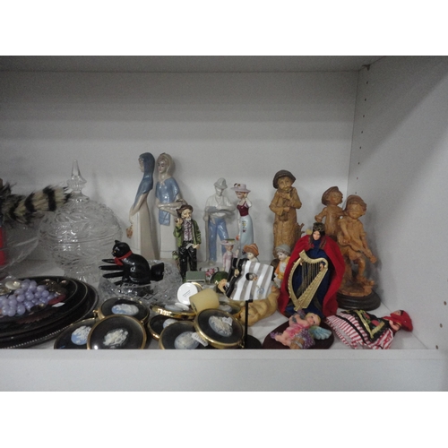 148 - Bell ornaments, Aynsley china, modern figures, plaques, trinket boxes etc (three shelves).