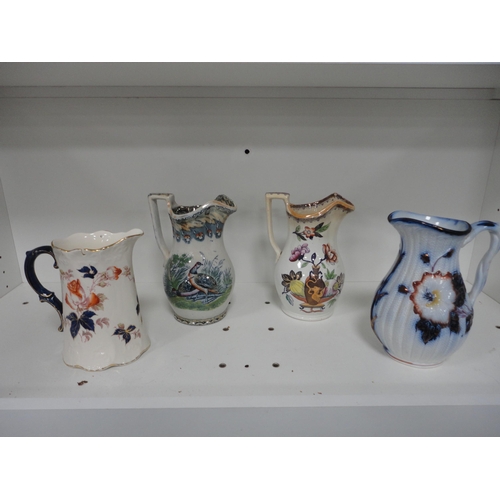 161 - Collection of Victorian pottery to include bowls, Victorian and later jugs, planter etc (one shelf).