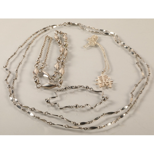 145 - Silver Chinese character pendant, with two white metal necklaces and a bracelet