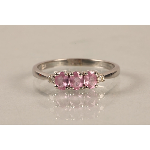 150 - 14ct white gold ring set with a trio of pink gems and diamond shoulders, gross weight 2g, ring size ... 