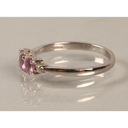 150 - 14ct white gold ring set with a trio of pink gems and diamond shoulders, gross weight 2g, ring size ... 