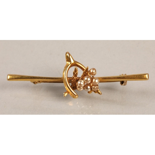 192 - 9ct gold brooch set with seed pearls, gross weight 2g