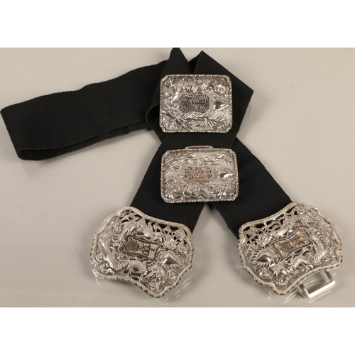 211 - Chinese silver belt buckles with dragon design (two sets), gross weight approx. 110g