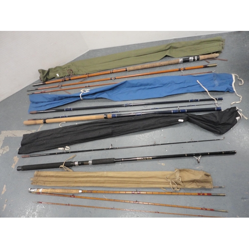 190 - Four assorted fishing rods to include a BMS split cane example, all with carry bags.  (4)