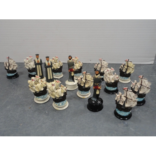 219 - Chess board and assorted unusual chess pieces in the form of Elizabethan characters and ships.