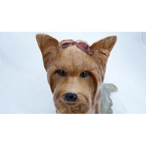 227 - Large Beswick glazed ceramic figure of a Yorkshire terrier with glass eyes.