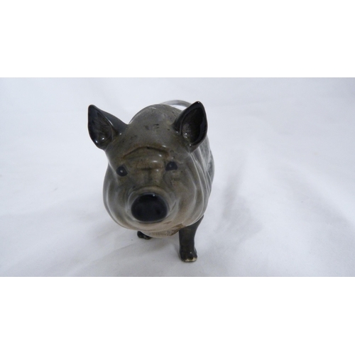 230 - Royal Doulton figure of a pot-bellied pig.