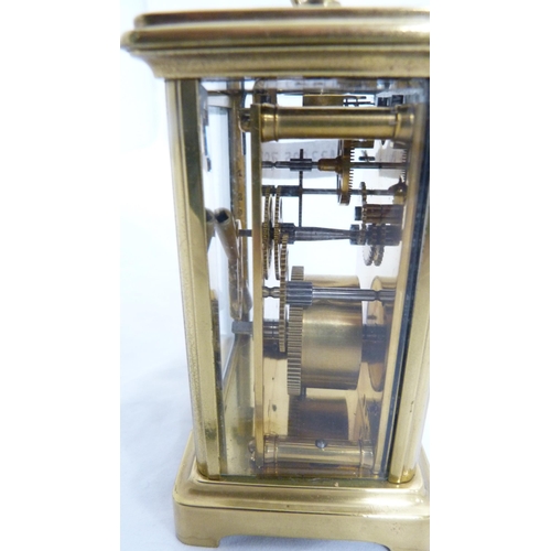 233 - Brass four glass carriage clock, with key.