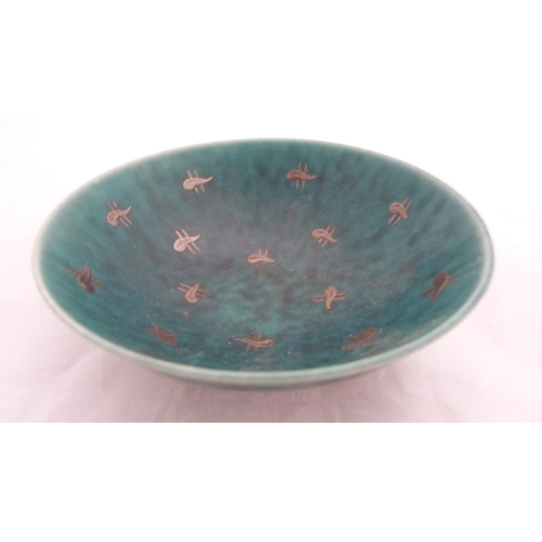 244 - Swedish Argenta green glazed small bowl and a marble-effect stand decorated with fish.  (2)