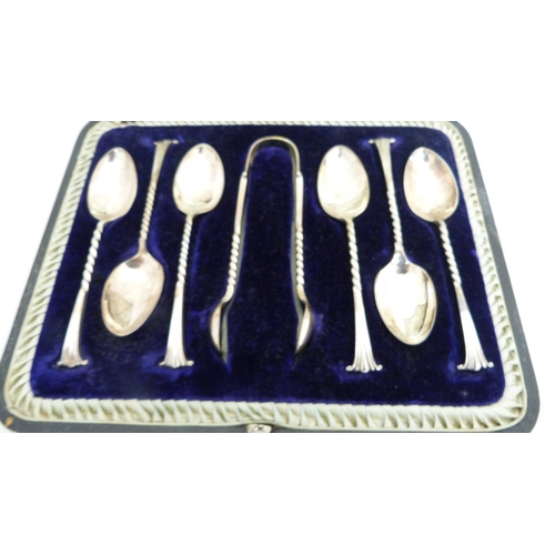 246 - Set of six silver teaspoons and tongs, cased.