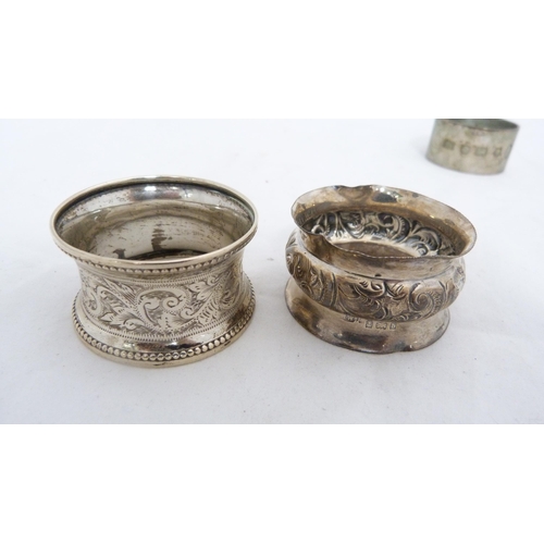 251 - Seven assorted silver napkin rings, 137g gross.