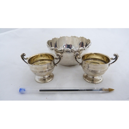 253 - Silver sugar bowl and a pair of small silver prize cups, 152g gross. (3)