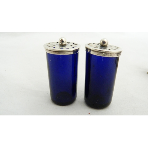 255 - Pair of silver pepper pots, silver condiment with blue glass liner, silver weight only 62g gross, al... 