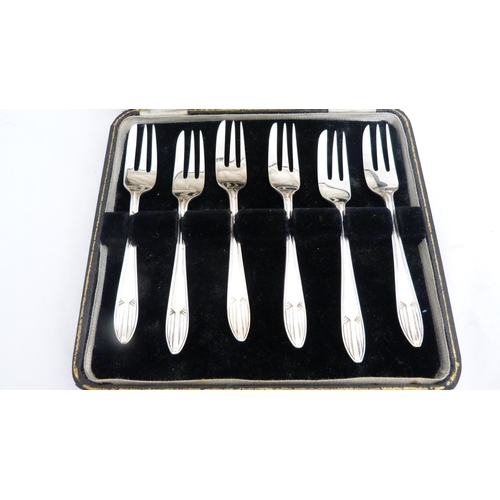 262 - Set of six sterling silver cake forks, cased.