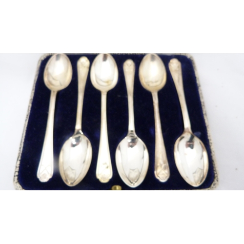 263 - Set of six silver golfing-themed coffee spoons, cased.