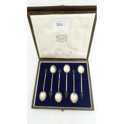 264 - Cased set of six silver coffee spoons with bean terminals, five matching Indian white metal export s... 