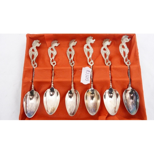 264 - Cased set of six silver coffee spoons with bean terminals, five matching Indian white metal export s... 