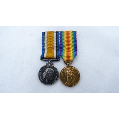 281 - Pair of WWI campaign medals, Victory and War, with ribbons, and matching dress miniatures, awarded t... 