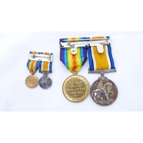 281 - Pair of WWI campaign medals, Victory and War, with ribbons, and matching dress miniatures, awarded t... 