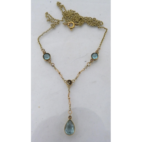 288 - Lady's gold necklace set with aquamarine-style gemstones, stamped 15ct to the clasp, 4.6g gross.