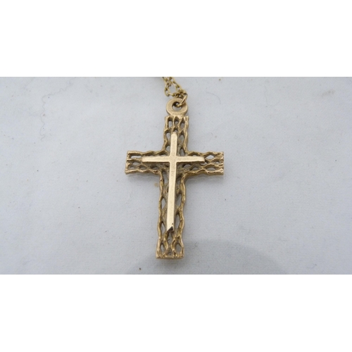 290 - 9ct gold cross pendant (2g) on an unmarked yellow metal chain.