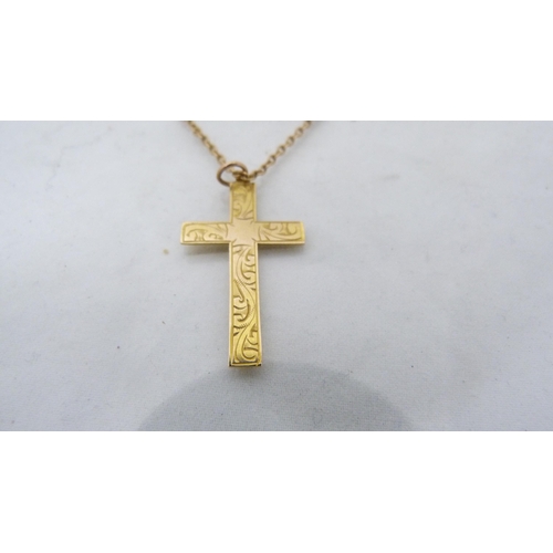 292 - 9ct gold chain (4.2g), with yellow metal cross pendant attached.