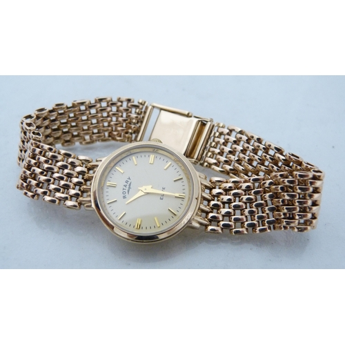 303 - 9ct gold Rotary lady's quartz wristwatch, 31g gross, with box and papers.