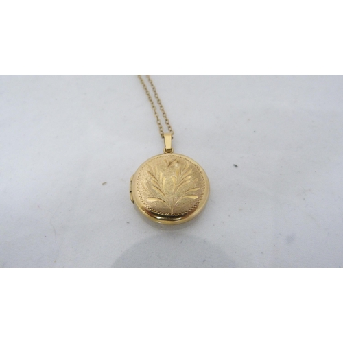 312 - 9ct gold chain (approximately 1.3g), with yellow metal locket.