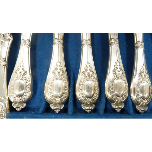 32 - Set of twelve EP-handled fruit knives and forks in a mahogany case, and another cased set of six EP-... 