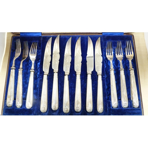 32 - Set of twelve EP-handled fruit knives and forks in a mahogany case, and another cased set of six EP-... 