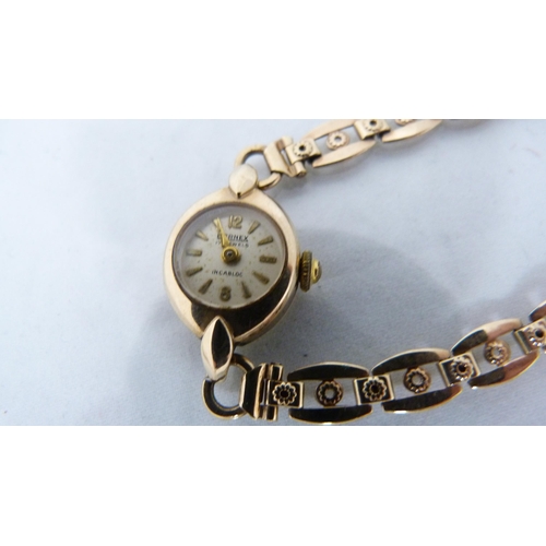 323 - 9ct gold Bernex lady's wristwatch, 12.2g gross.