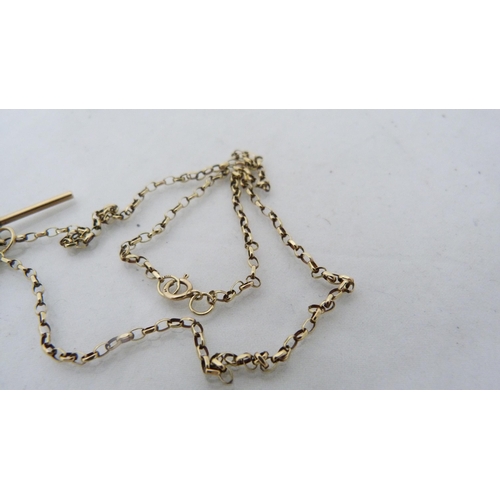 324 - 9ct gold lady's cross pendant on chain (approximately 3.2g), and an unmarked T-bar, possibly gold.&n... 