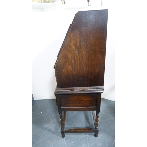 347 - Jacobean-style oak writing bureau and a similar oak elbow chair.  (2)