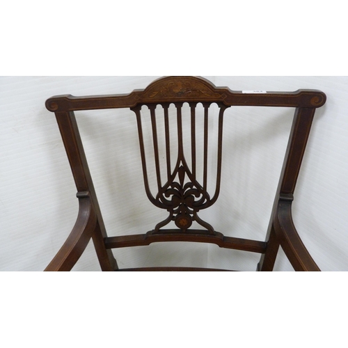 384 - Edwardian inlaid mahogany elbow chair.