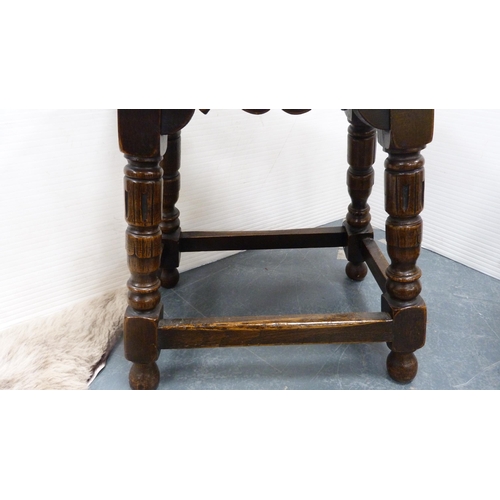 385 - Charles II style oak jointed stool and a pokerwork plant stand.